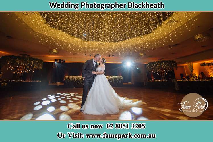 Photo of the Bride and Groom kissing at the dance floor Blackheath NSW 2785