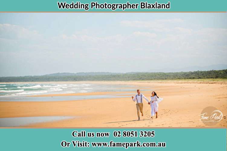 The Groom and the Bride running down the beach Blaxland NWS 2774