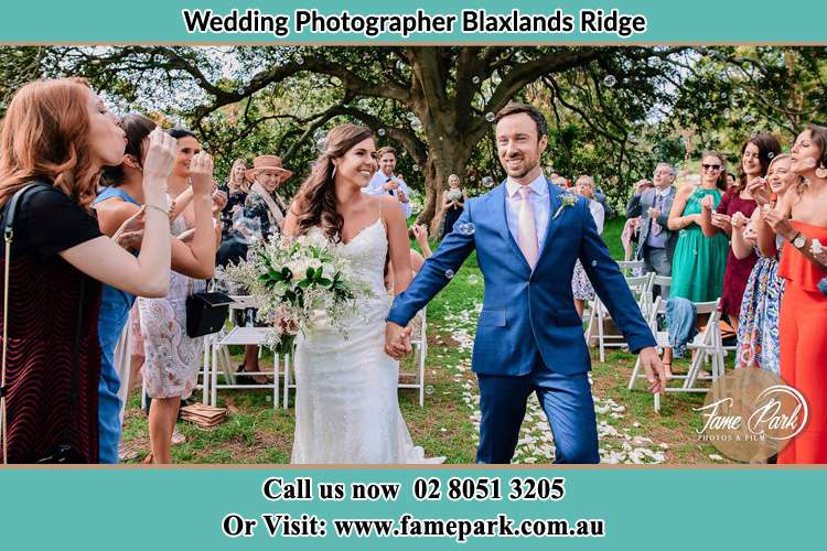 The Groom and the Bride holding hands while walking Blaxlands Ridge NWS 2758