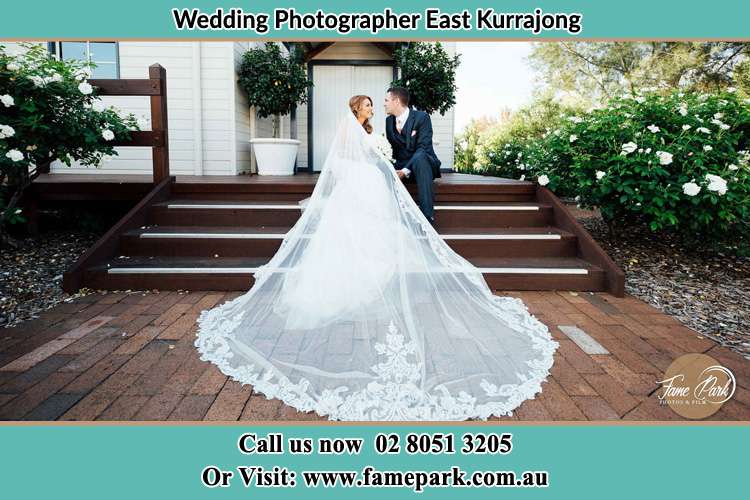 Photo of the Bride and Groom sitting in the stairs East Kurrajong NSW 2758