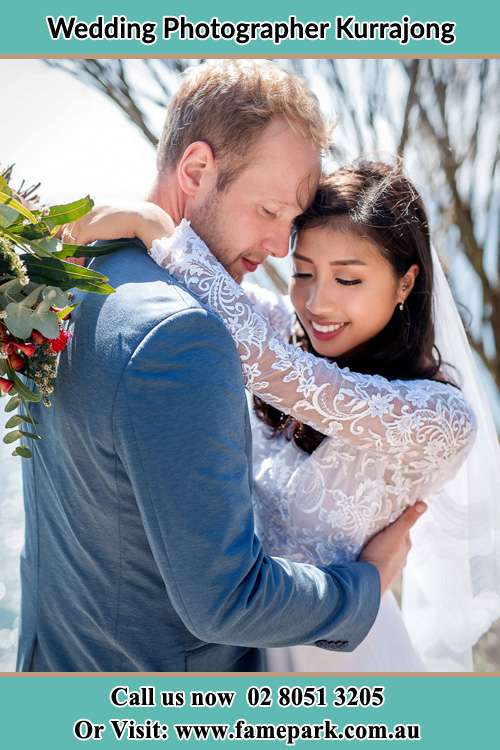 Bride and Groom held each other Kurrajong NSW 2758