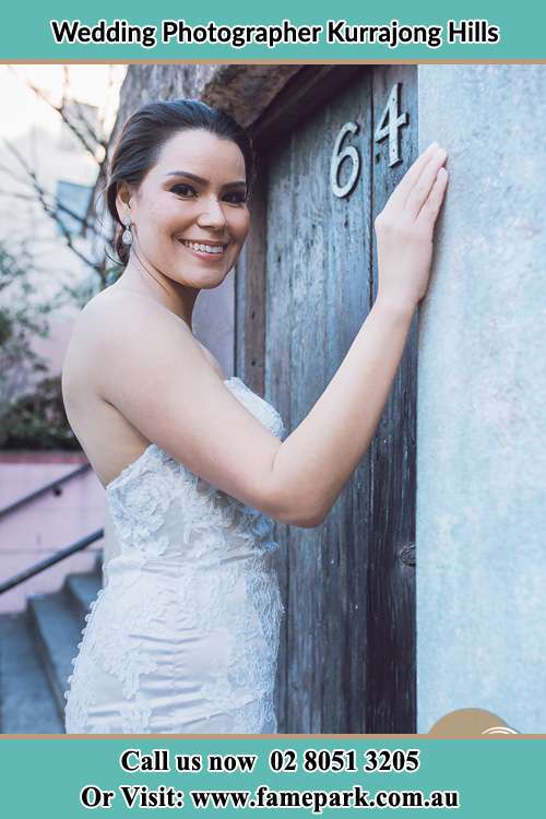 Bride in front of the door Kurrajong Hills NSW 2758