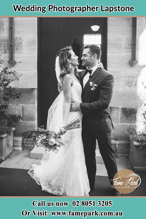 Bride and Groom held each other near the door Lapstone NSW 2783