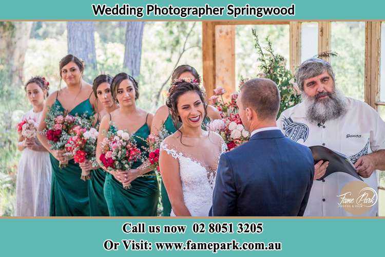 Photo of the Bride and the Groom during the ceremony Springwood