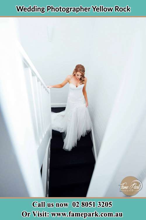 Photo of the Bride walking down the stairs Yellow Rock